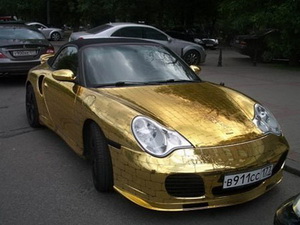золотой Porsche